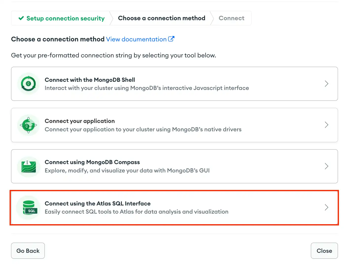 「Atlas SQL Interface を使用して接続する」オプションが強調表示されている Atlas 接続モーダルのスクリーンショット。